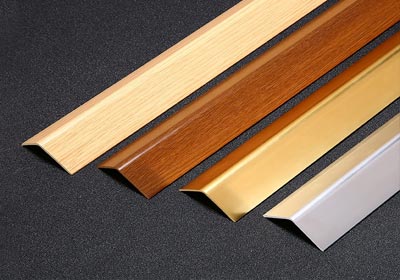Wood-effect corner guards installed in a modern office interior